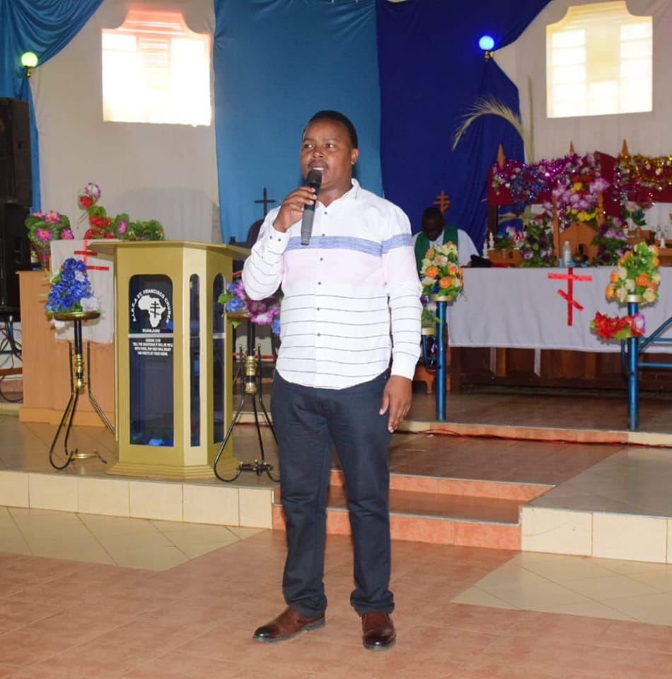Charles Justus addressing the public at St. Francis Church